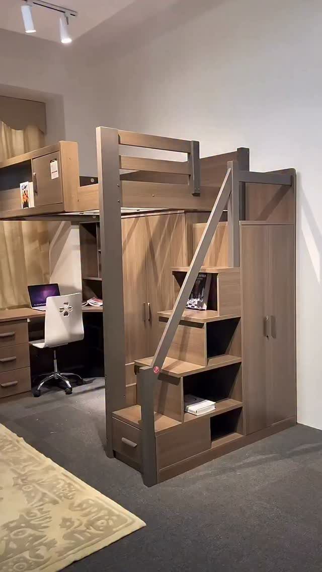 Wooden loft bed with a built-in study desk and shelving underneath in a bedroom.