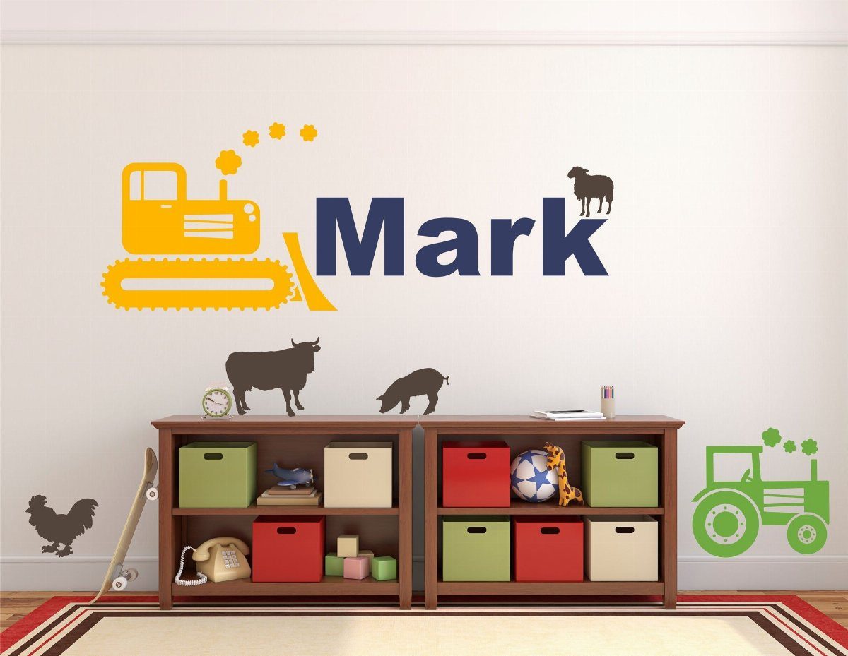Tractor and animal wall decals decorating a child's room above wooden toy shelves.